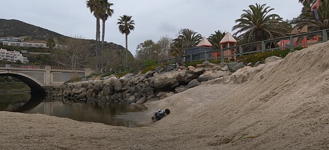 Arrma Fireteam beach bash with Proline racing Dumont Paddle tires ( Crashed in the water two times )